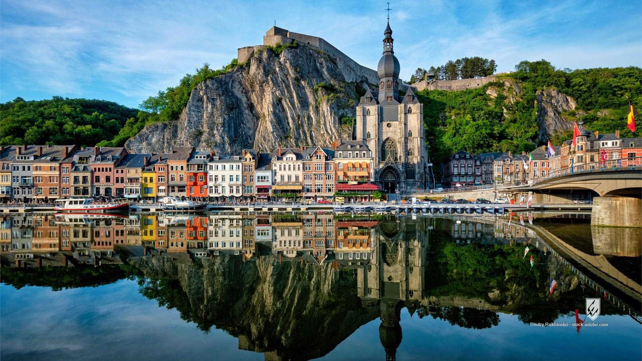 Dinant Belgium Dinant citadel Meuse river river houses Collegiate Church of Notre Dame de Dinant church boats
