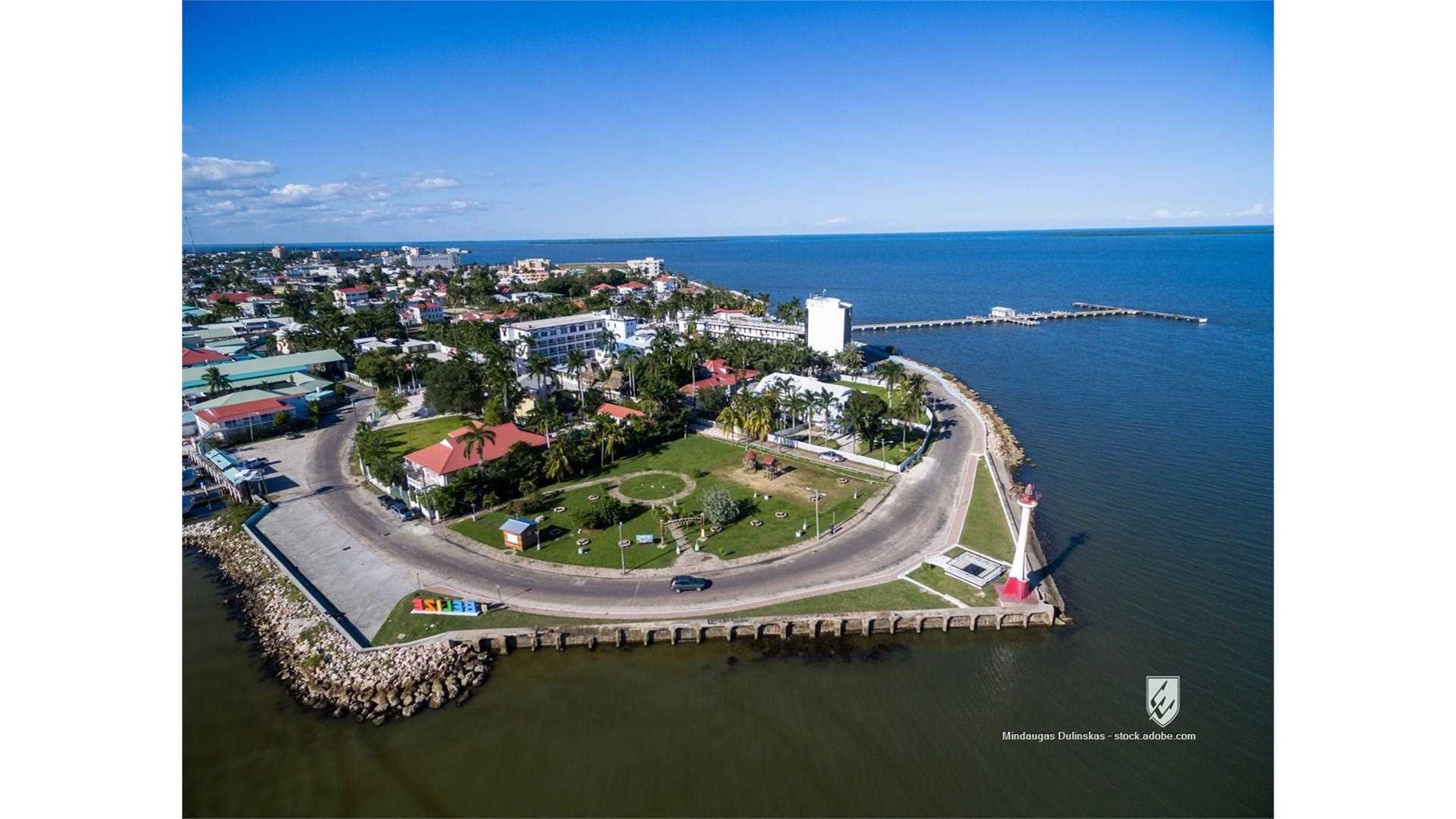 belize caribbean lighthouse pier port sea ocean harbor city palm road drone downtown nature vacation sunlight america
