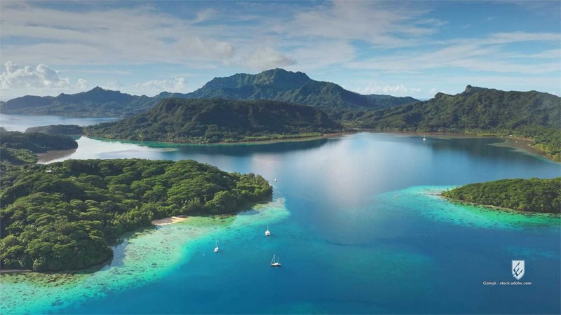 French Polynesia Bora Bora island aerial view tropical lagoon ocean sea water drone blue turquoise green lush vegetation