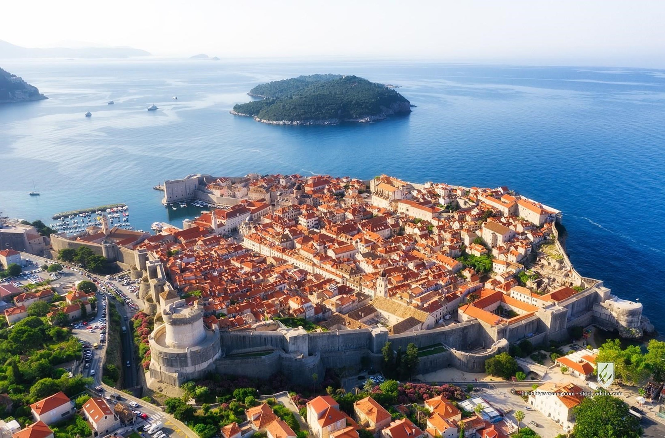 dubrovnik croatia aerial old city town boat sunset sundown surface sea europe adriatic dalmatia travel destination medie