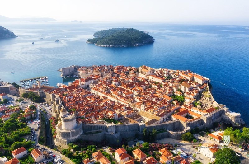 dubrovnik croatia aerial old city town boat sunset sundown surface sea europe adriatic dalmatia travel destination medie