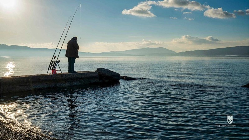 fishing fisherman Elefsina Greece bay sea ocean water pier dock solitude nature landscape waves reflection sunrise morni