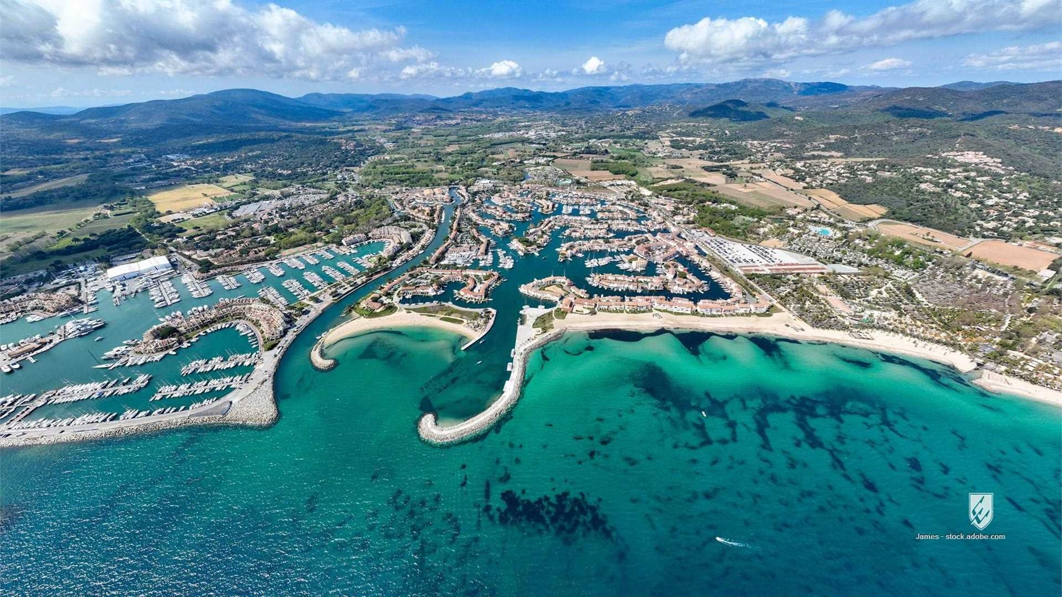 Port marina cogolin france bay saint tropez ocean sea sky drone aerial old town center holiday shopping social bars rest