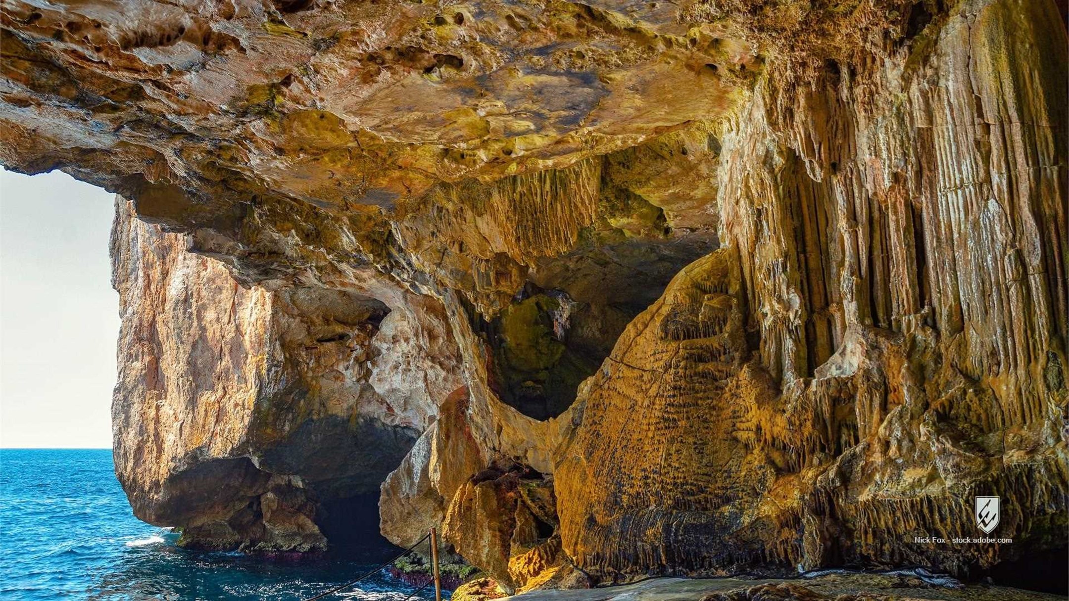 coastal cave Neptunes Cave Capo Caccia Alghero Sardinia Italy Mediterranean Sea cave interior rock formations stalactite