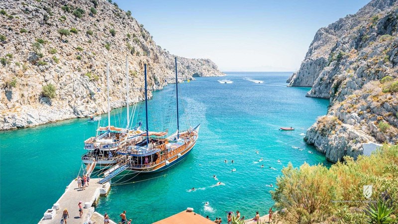 sea beach water island blue bay coast mediterranean summer greece travel sky ocean landscape nature coastline crete boat