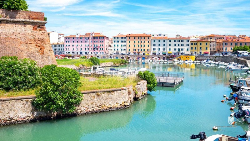 architecture blue boat canal colorfull day europe fortress harbor horizontal house itally livorno nobody outdoor sea