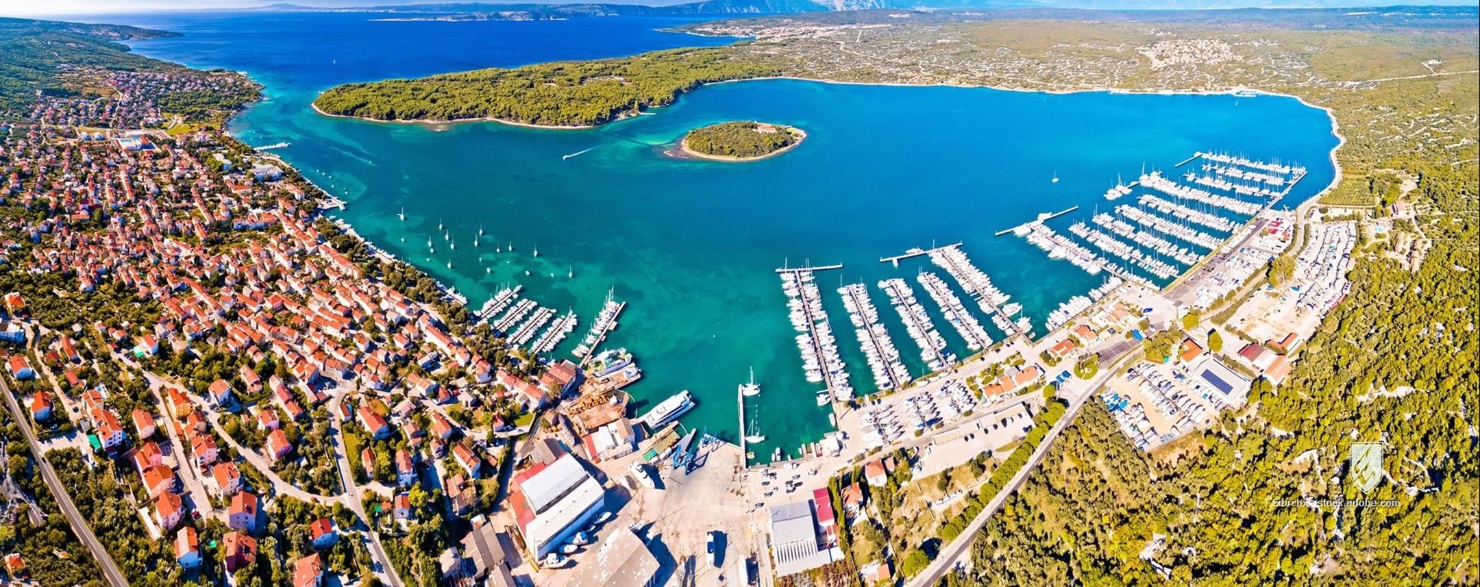 punat krk island kvarner bay tower historic paved building croatian tourism town travel vacation view stone rock street