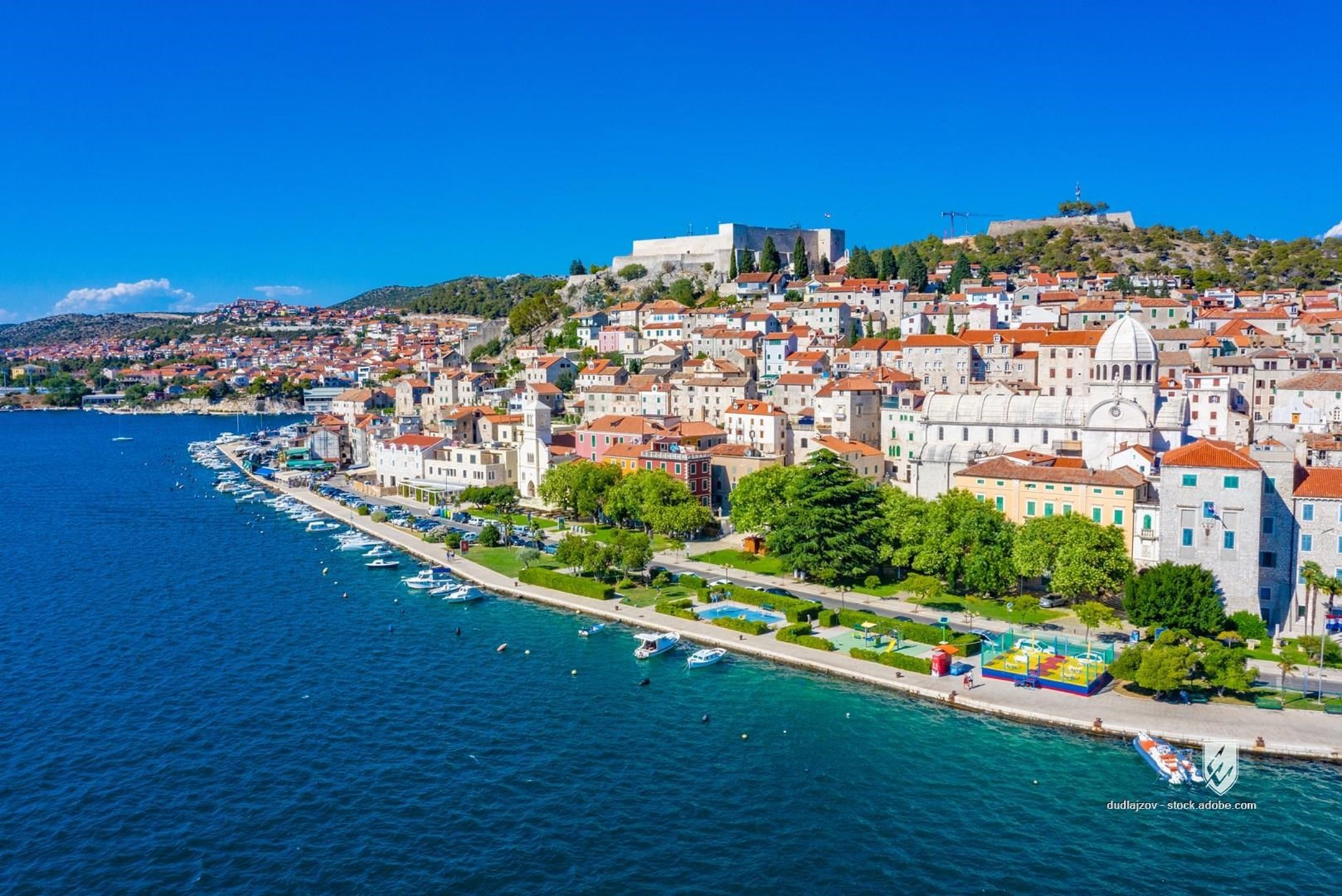 church cathedral riva waterfront sibenik marina quay boat building landmark promenade architecture shore harbour holiday