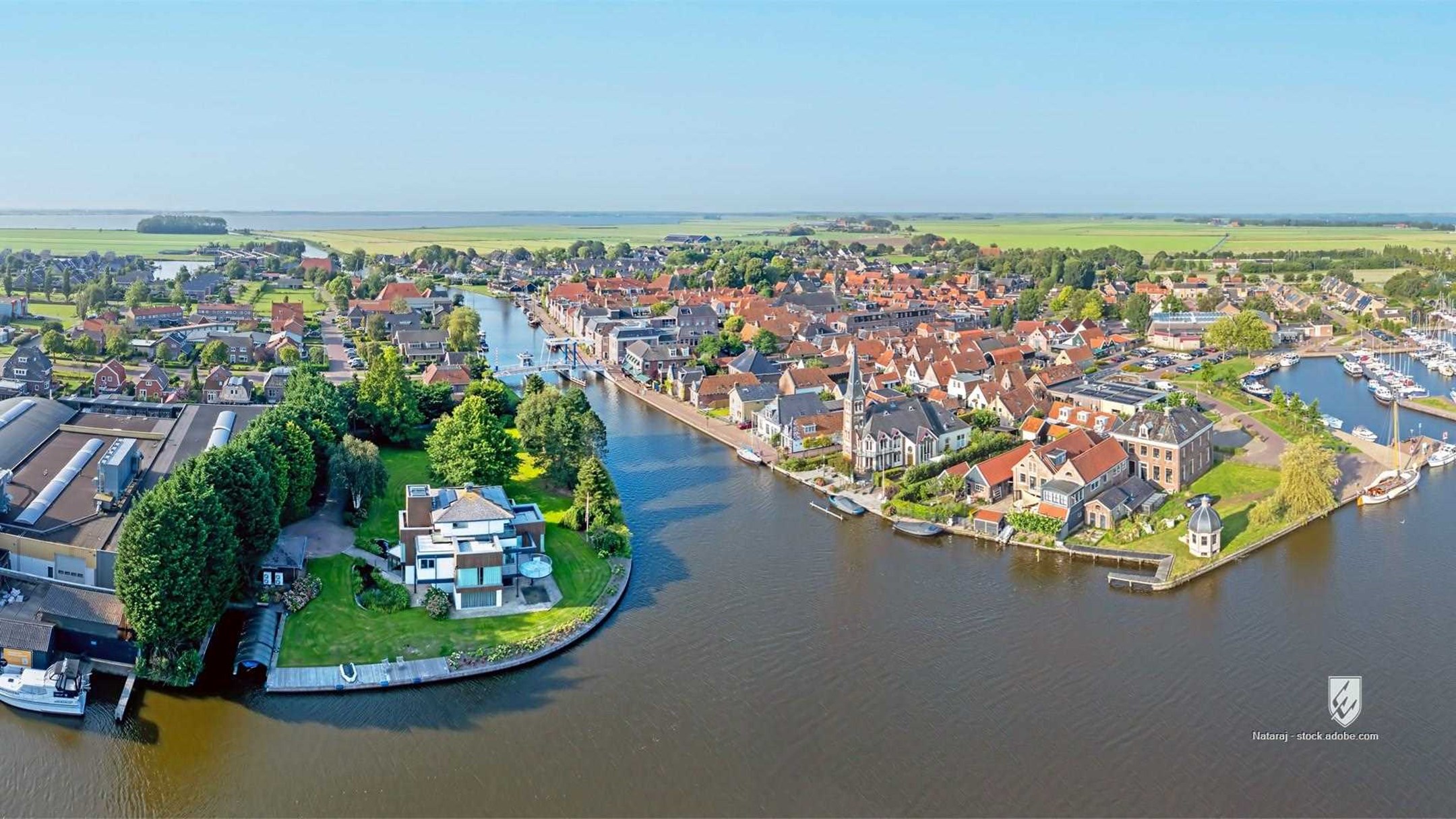 aerial view idyllic photography drone history sunlight village windmill canal netherlands travel destinations high angle